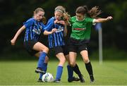16 May 2022; Sarah Reynolds of Peamount United in action against Felicity Ryan, centre, and Emily O'Donovan of Stepaside during the 2022 Clubforce DDSL Girls U13 League Cup Final match between Stepaside FC and Peamount United at the AUL in Dublin. Photo by Harry Murphy/Sportsfile