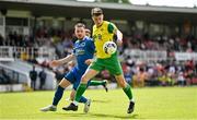 14 May 2022; Luke Casey of Rockmount AFC in action against Daniel Ridge of Bluebell United during the FAI Centenary Intermediate Cup Final 2021/2022 match between Rockmount AFC and Bluebell United at Turner's Cross in Cork. Photo by Seb Daly/Sportsfile