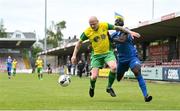 14 May 2022; Jason Sexton of Rockmount AFC in action against Sodiq Oguntola of Bluebell United during the FAI Centenary Intermediate Cup Final 2021/2022 match between Rockmount AFC and Bluebell United at Turner's Cross in Cork. Photo by Seb Daly/Sportsfile