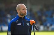 16 May 2022; Laois manager Declan Qualter is interviewed by TG4 before the Electric Ireland Leinster GAA Minor Hurling Championship Final match between Laois and Offaly at MW Hire O'Moore Park in Portlaoise, Laois. Photo by Harry Murphy/Sportsfile