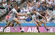 15 May 2022; Kevin Flynn of Kildare passes to teammate Daniel Flynn during the Leinster GAA Football Senior Championship Semi-Final match between Kildare and Westmeath at Croke Park in Dublin. Photo by Seb Daly/Sportsfile