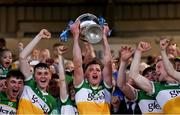 16 May 2022; Offaly captain Dan Ravenhill lifts the trophy after his side's victory in the Electric Ireland Leinster GAA Minor Hurling Championship Final match between Laois and Offaly at MW Hire O'Moore Park in Portlaoise, Laois. Photo by Harry Murphy/Sportsfile