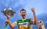 16 May 2022; Offaly captain Dan Ravenhill celebrates with the trophy after his side's victory in the Electric Ireland Leinster GAA Minor Hurling Championship Final match between Laois and Offaly at MW Hire O'Moore Park in Portlaoise, Laois. Photo by Harry Murphy/Sportsfile