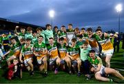 16 May 2022; Offaly players and supporters celebrate with the trophy after the Electric Ireland Leinster GAA Minor Hurling Championship Final match between Laois and Offaly at MW Hire O'Moore Park in Portlaoise, Laois. Photo by Harry Murphy/Sportsfile