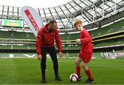 17 May 2022; The SPAR FAI Primary School 5s National Finals took place in AVIVA Stadium on Tuesday, May 17, where former Republic of Ireland International David Meyler and current Republic of Ireland women's footballer, Louise Quinn were in attendance supporting as girls and boys from 28 schools took to the field in a day that they will never forget. The 2022 SPAR FAI Primary School 5s Programme returned in physical form this year and saw an incredible 56,212 students involved from 1,081 schools. Pictured is former Republic of Ireland International David Meyler with Luke Kinsella at the Aviva Stadium in Dublin. Photo by Harry Murphy/Sportsfile
