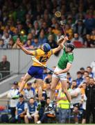 15 May 2022; Shane O'Donnell of Clare is tackled by Diarmaid Byrnes of Limerick during the Munster GAA Hurling Senior Championship Round 4 match between Clare and Limerick at Cusack Park in Ennis, Clare. Photo by Ray McManus/Sportsfile