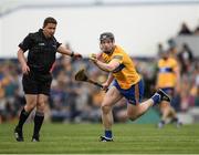 15 May 2022; Referee Colm Lyons steps out of the way as Tony Kelly of Clare prepares to takes a shot during the Munster GAA Hurling Senior Championship Round 4 match between Clare and Limerick at Cusack Park in Ennis, Clare. Photo by Ray McManus/Sportsfile