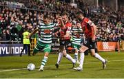 13 May 2022; Graham Burke of Shamrock Rovers in action against Cameron Dummigan, centre, and Daniel Lafferty of Derry City during the SSE Airtricity League Premier Division match between Shamrock Rovers and Derry City at Tallaght Stadium in Dublin. Photo by Seb Daly/Sportsfile