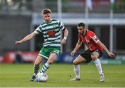 13 May 2022; Ronan Finn of Shamrock Rovers in action against Daniel Lafferty of Derry City during the SSE Airtricity League Premier Division match between Shamrock Rovers and Derry City at Tallaght Stadium in Dublin. Photo by Seb Daly/Sportsfile