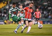 13 May 2022; Danny Mandroiu of Shamrock Rovers in action against Cameron Dummigan of Derry City during the SSE Airtricity League Premier Division match between Shamrock Rovers and Derry City at Tallaght Stadium in Dublin. Photo by Seb Daly/Sportsfile