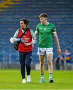 14 May 2022; Chartered physiotherapist Kathryn Fahy with James Naughton of Limerick during the Munster GAA Senior Football Championship Semi-Final match between Tipperary and Limerick at FBD Semple Stadium in Thurles, Tipperary. Photo by Diarmuid Greene/Sportsfile
