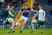 14 May 2022; Martin Kehoe of Tipperary in action against Michael Donovan and Donal O'Sullivan of Limerick during the Munster GAA Senior Football Championship Semi-Final match between Tipperary and Limerick at FBD Semple Stadium in Thurles, Tipperary. Photo by Diarmuid Greene/Sportsfile