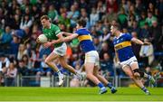 14 May 2022; Brian Donovan of Limerick in action against Jack Kennedy and Luke Boland of Tipperary during the Munster GAA Senior Football Championship Semi-Final match between Tipperary and Limerick at FBD Semple Stadium in Thurles, Tipperary. Photo by Diarmuid Greene/Sportsfile