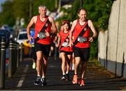 17 May 2022; Gerry Byrne, left, and Colin O'Gara of Lucan Harriers AC, Dublin, warm-up before the Kia Race Series – Bob Heffernan & Mary Hanley 5K in Enfield, Meath. Photo by Ben McShane/Sportsfile