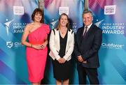 17 May 2022; MC Gráinne McElwain, Mary O'Connor, CEO, Federation of Irish Sport, and Rob Hartnett, CEO and Founder of Sport for Business, during the Irish Sport Industry Awards 2022, in association with Clubforce, at The Westin Hotel in Dublin. Photo by Stephen McCarthy/Sportsfile