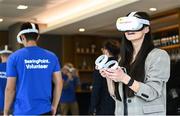 18 May 2022; BearingPoint, the official innovation partner of Leinster Rugby, has today hosted a milestone event showcasing the capabilities of metaverse technology for the Leinster Rugby sporting community, pictured is Aisling O'Reilly of Off The Ball wearing a VR headset at the UCD University Club in Dublin. Photo by Harry Murphy/Sportsfile