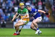 16 May 2022; Donal Shirley of Offaly in action against Eoghan Cuddy of Laois during the Electric Ireland Leinster GAA Minor Hurling Championship Final match between Laois and Offaly at MW Hire O'Moore Park in Portlaoise, Laois. Photo by Harry Murphy/Sportsfile