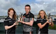 19 May 2022; PwC GPA Players of the Month for March in camogie, Róisín McCormick of Antrim, right, and in ladies football, Louise Ní Mhuircheartaigh of Kerry, left, alongside PwC GAA/GPA Hurler of the Month for March Stephen Bennett of Waterford, with their awards today at PwC's Cork offices. Photo by Seb Daly/Sportsfile