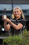 19 May 2022; PwC GPA Player of the Month for March in camogie, Róisín McCormick of Antrim with her awards today at PwC's Cork offices. Photo by Seb Daly/Sportsfile
