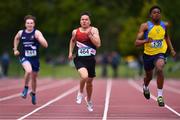 19 May 2022; David Forkan of SM&P Swinford, Mayo, centre, and Sean Chuka of Colaiste Einde, Galway, right, compete in the Senior Boys 200m event at the Irish Life Health Connacht Schools Track and Field Championships at TUS Athlone in Westmeath. Photo by Ben McShane/Sportsfile