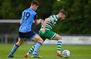19 May 2022; Jack Byrne of Shamrock Rovers in action against Lennon Gill of UCD during the SSE Airtricity League Premier Division match between UCD and Shamrock Rovers at UCD Bowl in Belfield, Dublin. Photo by Brendan Moran/Sportsfile