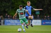 19 May 2022; Danny Mandroiu of Shamrock Rovers is tackled by Alex Nolan of UCD during the SSE Airtricity League Premier Division match between UCD and Shamrock Rovers at UCD Bowl in Belfield, Dublin. Photo by Brendan Moran/Sportsfile