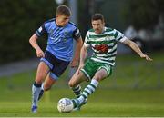 19 May 2022; Evan Caffrey of UCD in action against Aaron Greene of Shamrock Rovers during the SSE Airtricity League Premier Division match between UCD and Shamrock Rovers at UCD Bowl in Belfield, Dublin. Photo by Brendan Moran/Sportsfile