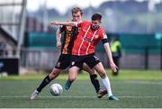 20 May 2022; Will Patching of Derry City in action against Greg Sloggett of Dundalk during the SSE Airtricity League Premier Division match between Derry City and Dundalk at The Ryan McBride Brandywell Stadium in Derry. Photo by Ben McShane/Sportsfile