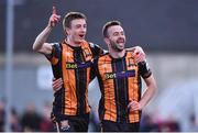 20 May 2022; Robbie Benson of Dundalk celebrates with teammate Daniel Kelly, left, after scoring his side's first goal during the SSE Airtricity League Premier Division match between Derry City and Dundalk at The Ryan McBride Brandywell Stadium in Derry. Photo by Ben McShane/Sportsfile