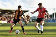 20 May 2022; Steven Bradley of Dundalk in action against Cameron McJannet of Derry City during the SSE Airtricity League Premier Division match between Derry City and Dundalk at The Ryan McBride Brandywell Stadium in Derry. Photo by Ben McShane/Sportsfile