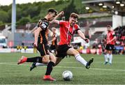 20 May 2022; Steven Bradley of Dundalk in action against Cameron McJannet of Derry City during the SSE Airtricity League Premier Division match between Derry City and Dundalk at The Ryan McBride Brandywell Stadium in Derry. Photo by Ben McShane/Sportsfile