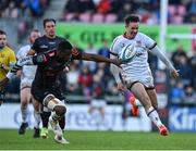 20 May 2022; Billy Burns of Ulster kicks ahead of Aphelele Fassi of Cell C Sharks during the United Rugby Championship match between Ulster and Cell C Sharks at Kingspan Stadium in Belfast. Photo by Brendan Moran/Sportsfile