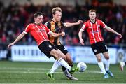 20 May 2022; Joe Thomson of Derry City in action against Greg Sloggett of Dundalk during the SSE Airtricity League Premier Division match between Derry City and Dundalk at The Ryan McBride Brandywell Stadium in Derry. Photo by Ben McShane/Sportsfile