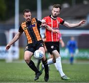 20 May 2022; Robbie Benson of Dundalk in action against Cameron Dummigan of Derry City during the SSE Airtricity League Premier Division match between Derry City and Dundalk at The Ryan McBride Brandywell Stadium in Derry. Photo by Ben McShane/Sportsfile