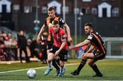 20 May 2022; Brandon Kavanagh of Derry City in action against Lewis Macari, left, and Robbie Benson of Dundalk during the SSE Airtricity League Premier Division match between Derry City and Dundalk at The Ryan McBride Brandywell Stadium in Derry. Photo by Ben McShane/Sportsfile