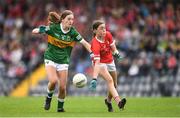 21 May 2022; Lauren Finnegan of Cork in action against Siofra Randles of Kerry during the Ladies Football U14 All-Ireland Platinum Final match between Cork and Kerry at Páirc Uí Rinn in Cork. Photo by Eóin Noonan/Sportsfile