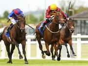 21 May 2022; Hellsing, with Colin Keane up, on their way to winning The Tally Ho Stud Irish EBF Maiden from second place Congo River with Ryan Moore during the Tattersalls Irish Guineas Festival at The Curragh Racecourse in Kildare. Photo by Matt Browne/Sportsfile