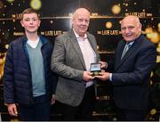 20 May 2022; FAI president Gerry McAnaney presents John Charlton, son of the late Jack Charlton, Republic of Ireland manager, and John Charlton Jnr, with an FAI centenary medal during the FAI Centenary Late Late Show Special at RTE Studios in Dublin. Photo by Stephen McCarthy/Sportsfile