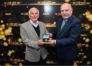 20 May 2022; FAI president Gerry McAnaney presents Mick Cooke with an FAI centenary medal during the FAI Centenary Late Late Show Special at RTE Studios in Dublin. Photo by Stephen McCarthy/Sportsfile