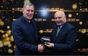 20 May 2022; FAI president Gerry McAnaney presents former Republic of Ireland international Packie Bonner with an FAI centenary medal during the FAI Centenary Late Late Show Special at RTE Studios in Dublin. Photo by Stephen McCarthy/Sportsfile