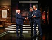 20 May 2022; President of Ireland Michael D Higgins presents former Republic of Ireland international David O’Leary with an FAI centenary medal during the FAI Centenary Late Late Show Special at RTE Studios in Dublin. Photo by Stephen McCarthy/Sportsfile