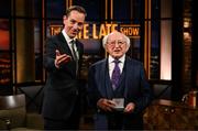 20 May 2022; President of Ireland Michael D Higgins is presented with an FAI centenary medal by The Late Late Show presenter Ryan Tubridy during the FAI Centenary Late Late Show Special at RTE Studios in Dublin. Photo by Stephen McCarthy/Sportsfile