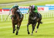 21 May 2022; Brad The Brief,right, with William Buick up, on their way to winning The Weatherbys Ireland Greenlands Stakes from second place Mooneista with Billy Lee during the Tattersalls Irish Guineas Festival at The Curragh Racecourse in Kildare. Photo by Matt Browne/Sportsfile