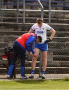 21 May 2022; Brian Lynch of Waterford gets treatment on his leg from team physio Michael O'Sullivan ahead of the Tailteann Cup Preliminary Round match between Wicklow and Waterford at County Grounds in Aughrim, Wicklow. Photo by Daire Brennan/Sportsfile