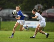 21 May 2022; Grace Hogan of Tipperary in action against Aoife O'Riain of Kildare during theLadies Football U14 All-Ireland Gold Final match between Kildare and Tipperary at Crettyard GAA in Laois. Photo by Ray McManus/Sportsfile
