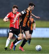 20 May 2022; Steven Bradley of Dundalk and Cameron McJannet of Derry City during the SSE Airtricity League Premier Division match between Derry City and Dundalk at The Ryan McBride Brandywell Stadium in Derry. Photo by Ben McShane/Sportsfile