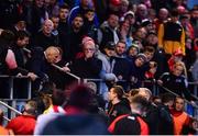 20 May 2022; Daniel Kelly of Dundalk disputes with a Derry City supporter during the SSE Airtricity League Premier Division match between Derry City and Dundalk at The Ryan McBride Brandywell Stadium in Derry. Photo by Ben McShane/Sportsfile