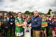 21 May 2022; Kerry captain Jamie Lee O'Connor is presented with the cup by Robbie Smyth, Munster LGFA President, after the Ladies Football U14 All-Ireland Platinum Final match between Cork and Kerry at Páirc Uí Rinn in Cork. Photo by Eóin Noonan/Sportsfile