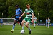 19 May 2022; Rory Gaffney of Shamrock Rovers in action against Eric Yoro of UCD during the SSE Airtricity League Premier Division match between UCD and Shamrock Rovers at UCD Bowl in Belfield, Dublin. Photo by Brendan Moran/Sportsfile