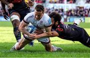 20 May 2022; Michael Lowry of Ulster scores his side's first try despite the tackle of Jaden Hendrikse of Cell C Sharks during the United Rugby Championship match between Ulster and Cell C Sharks at Kingspan Stadium in Belfast. Photo by John Dickson/Sportsfile